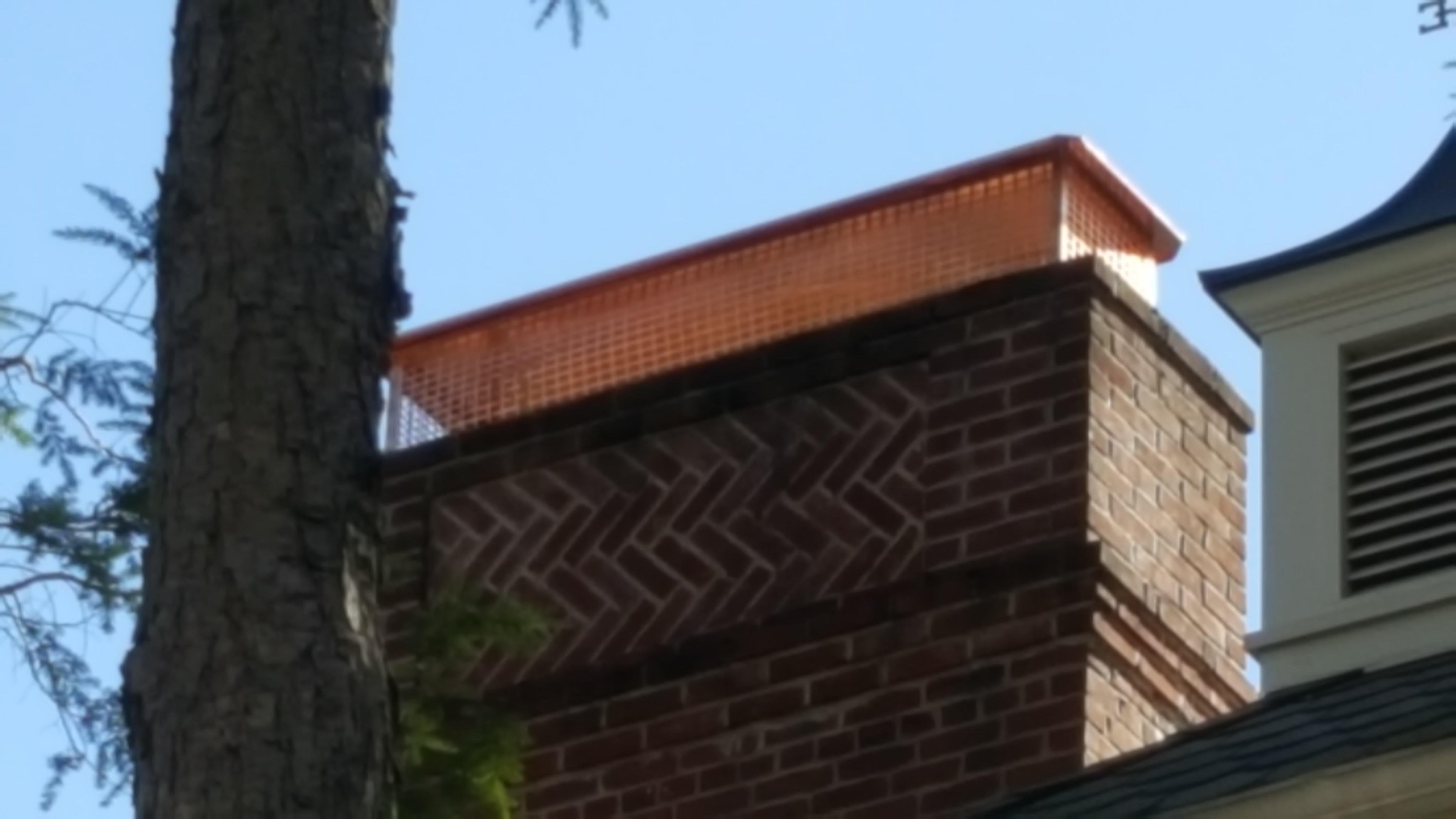 New stainless steel chimney cap installed in Southampton, NY