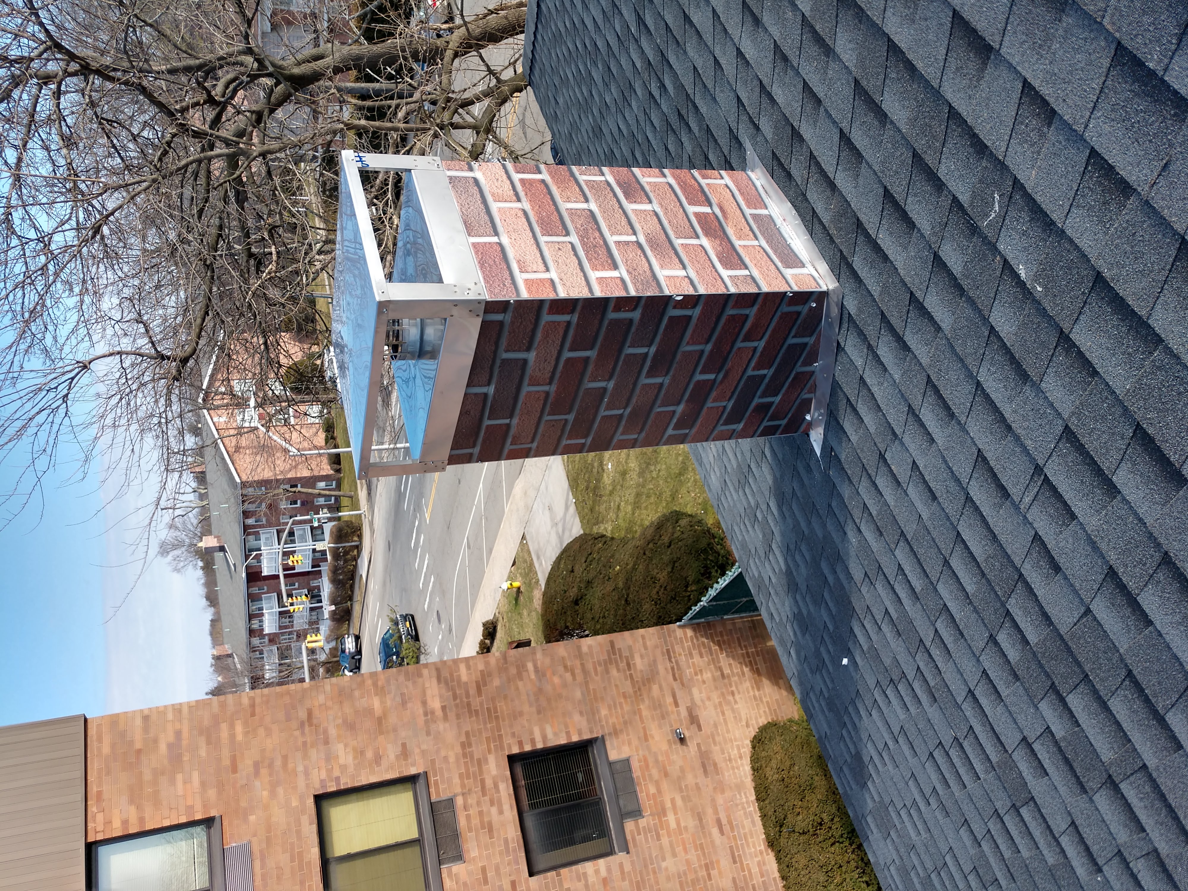 New elastomeric sealant applied to chimney crown in Southampton, NY