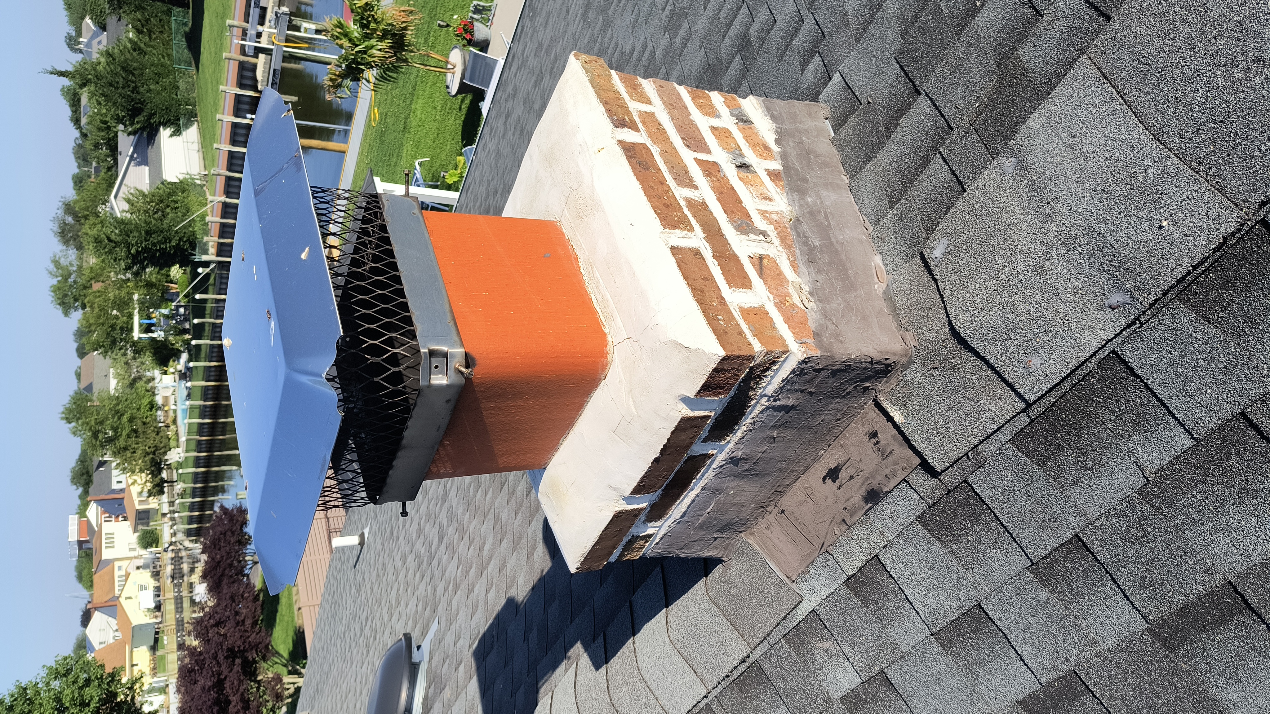 Full chimney masonry rebuild and restoration in Southampton, NY