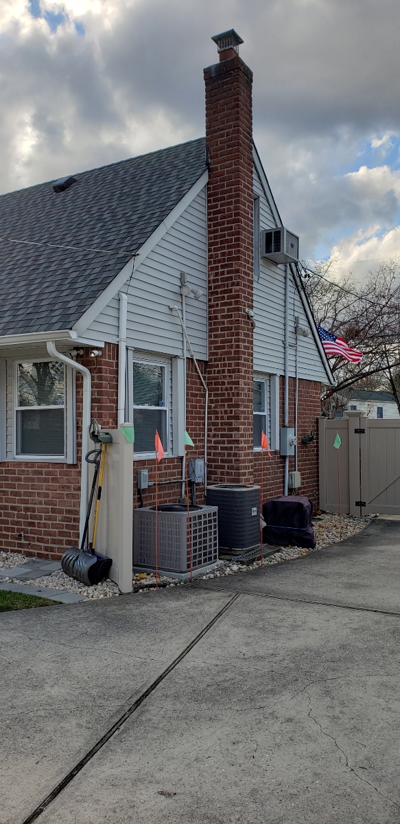 Professional chimney repointing restoring brick joints in Southampton, NY