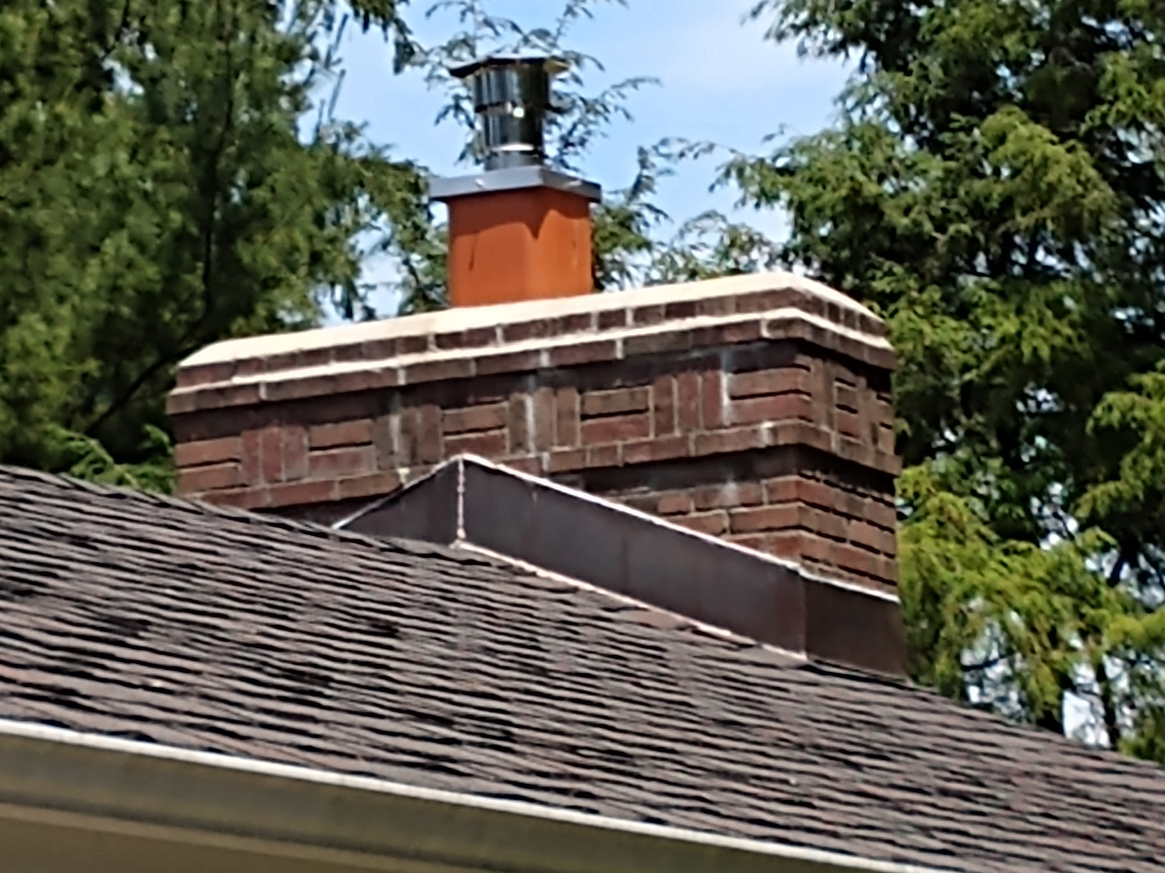 Stainless steel chimney cap with animal guard in Southampton, New York
